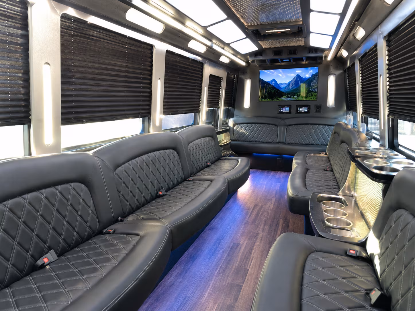 Wedding guests seated inside a party bus serving Irving