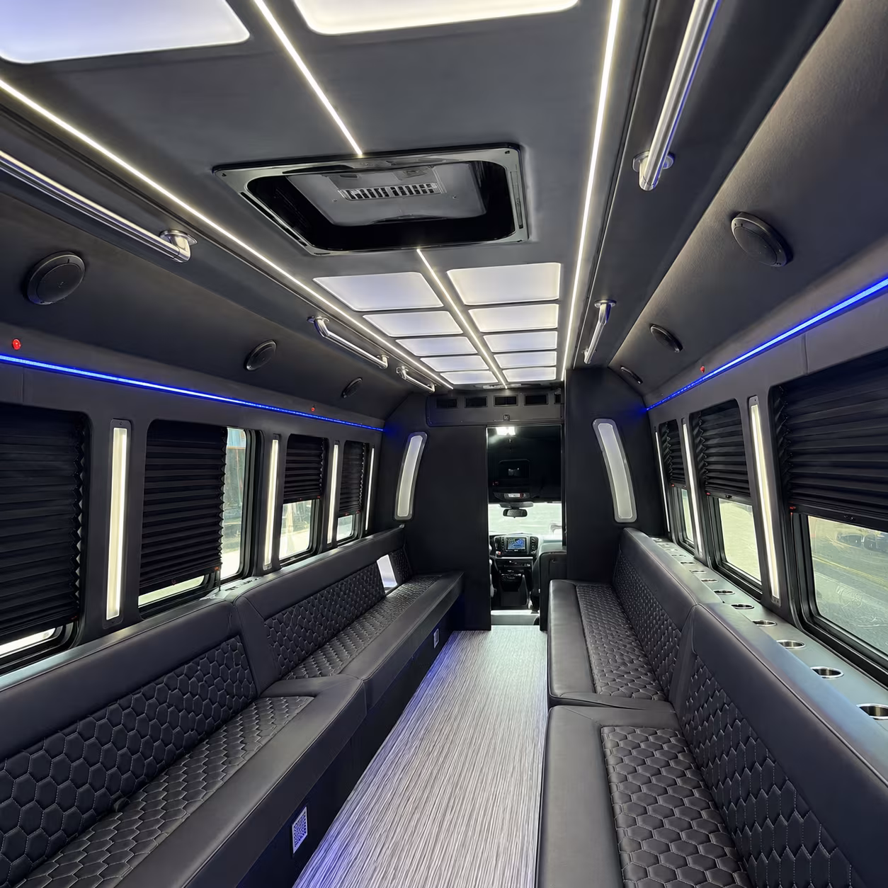 Passenger seating aboard a party bus rental serving Irving